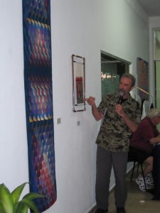 Jean Pierre Larochette discussing his latest tapestry.